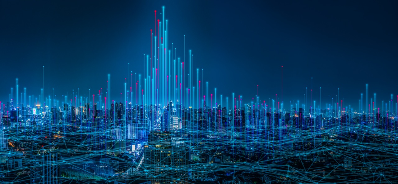 Modern city with wireless network connection and city scape concept.Wireless network and Connection technology concept with city background at night.